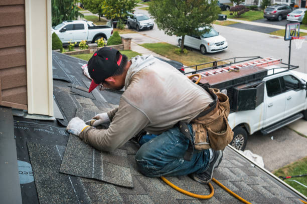 Professional Roofing technician working in Ottawa Lake, MI